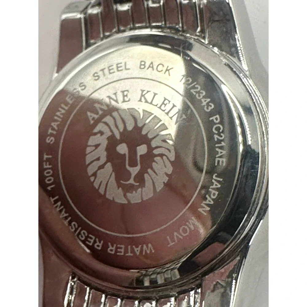 Anne Klein 12/2343 New Battery New York Crystal Accented Silver 32MM 5.5